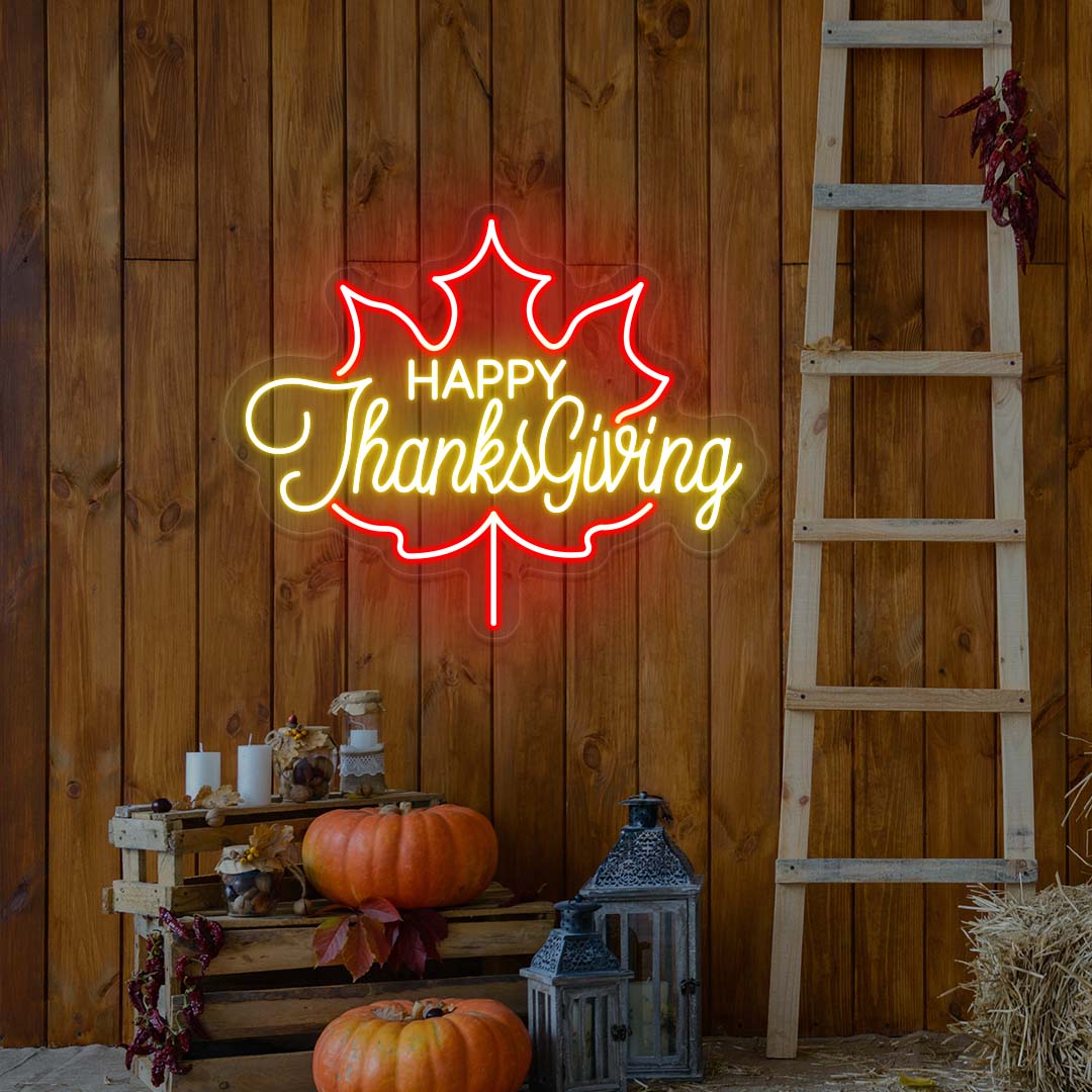 Happy Thanksgiving neon sign in red and yellow maple leaf shape, fall farmhouse wall decor with pumpkins and rustic ladder