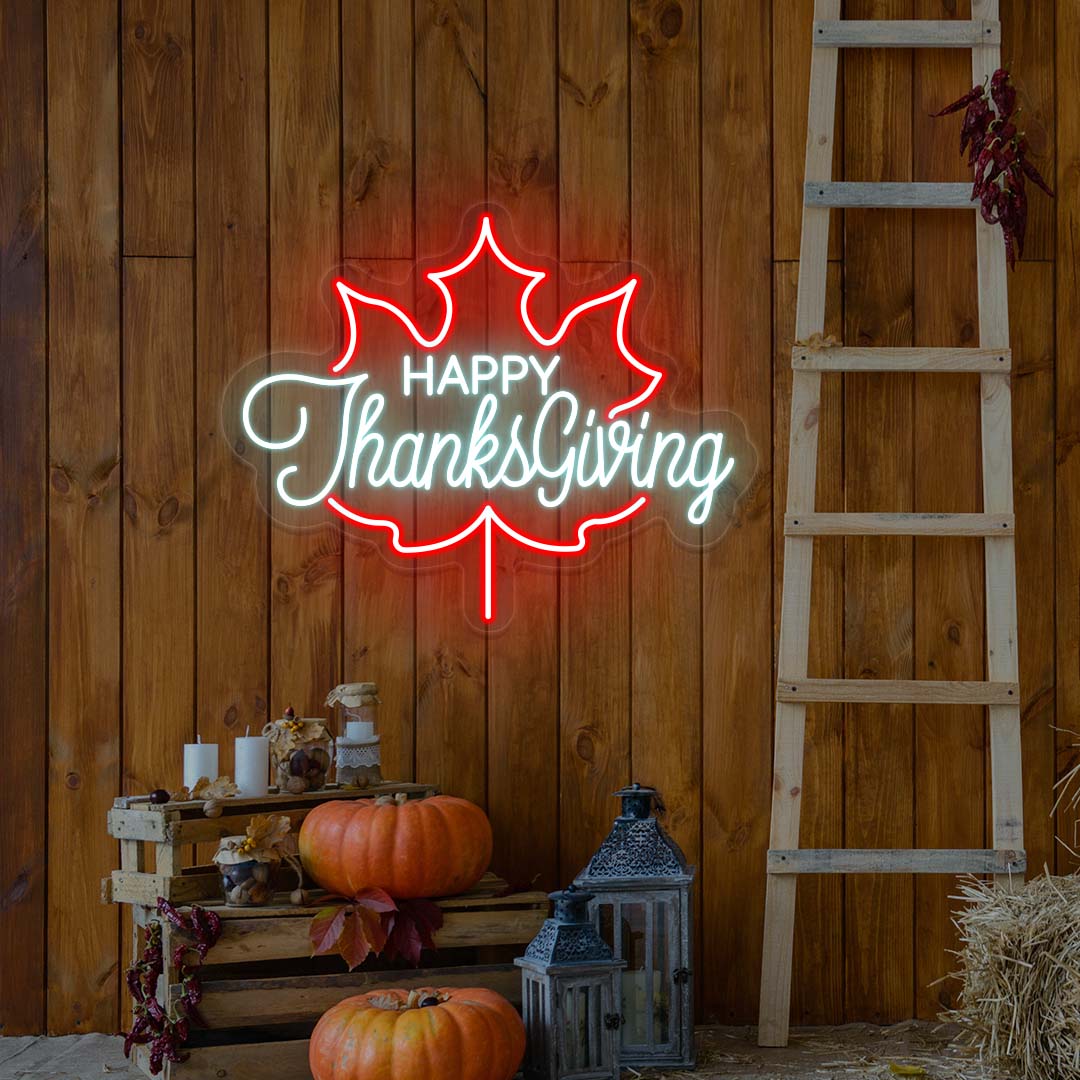 Happy Thanksgiving neon sign in red and iceblue maple leaf shape, fall farmhouse wall decor with pumpkins and rustic ladder