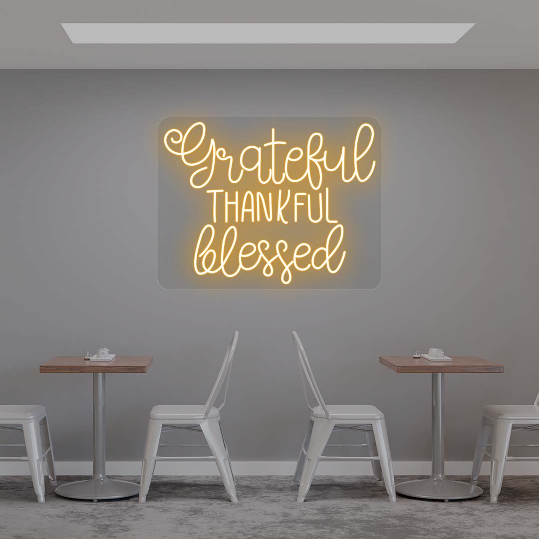 Grateful Thankful Blessed orange neon sign wall decor in modern cafe dining area