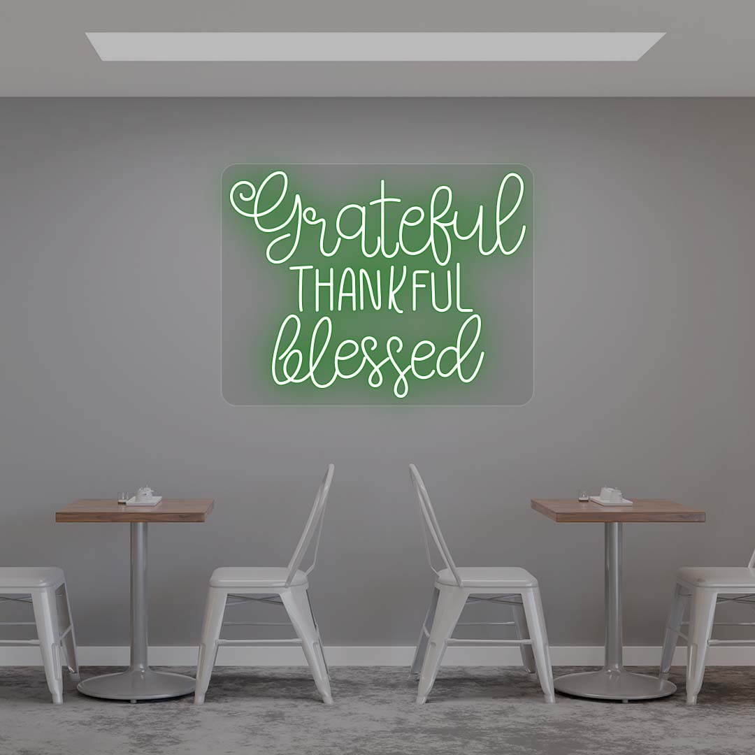 Grateful Thankful Blessed green neon sign wall decor in modern cafe dining area