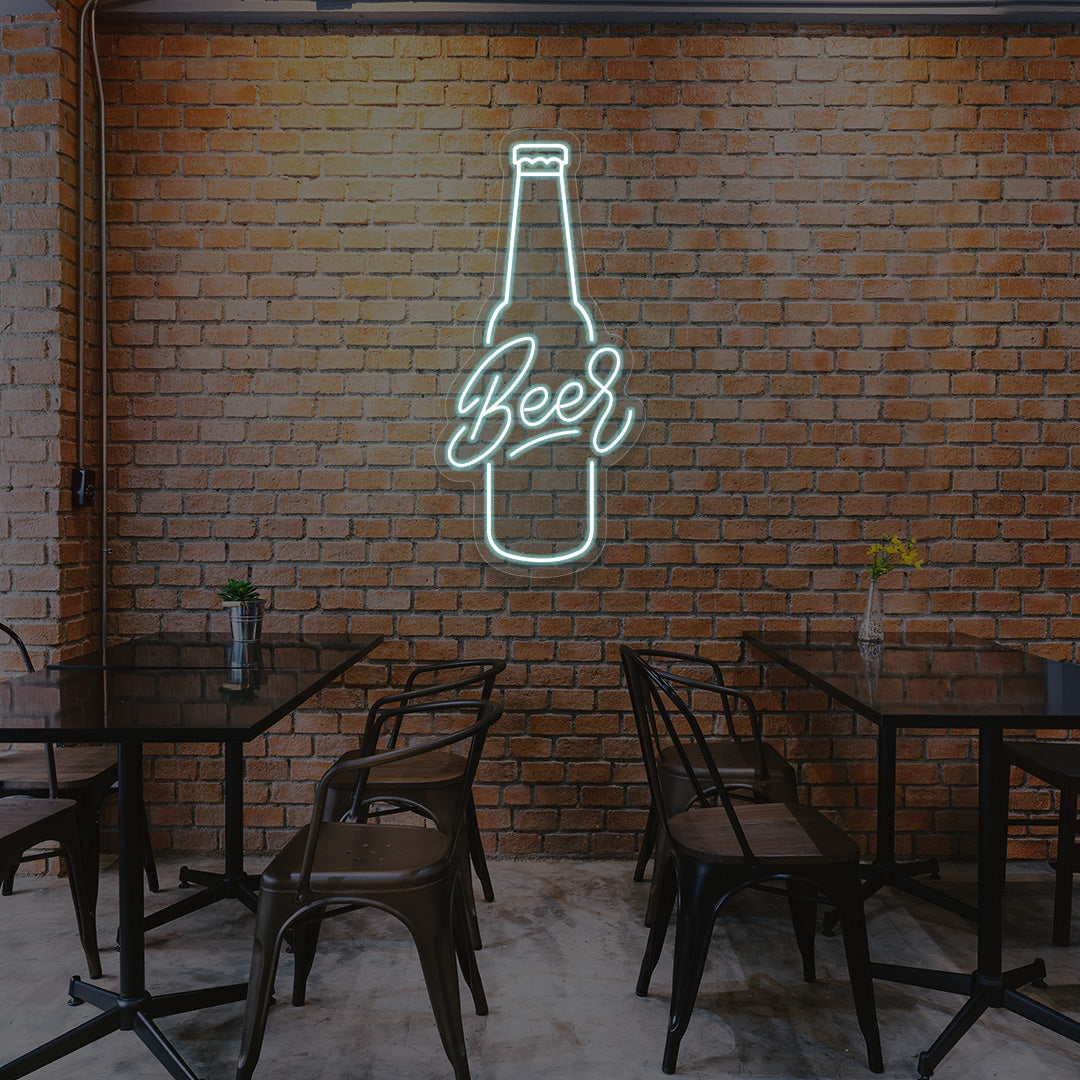 ice blue beer pint bar neon sign mounted on a wall