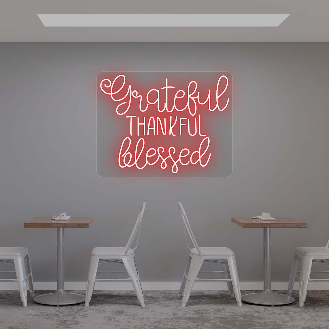 Grateful Thankful Blessed red neon sign wall decor in modern cafe dining area