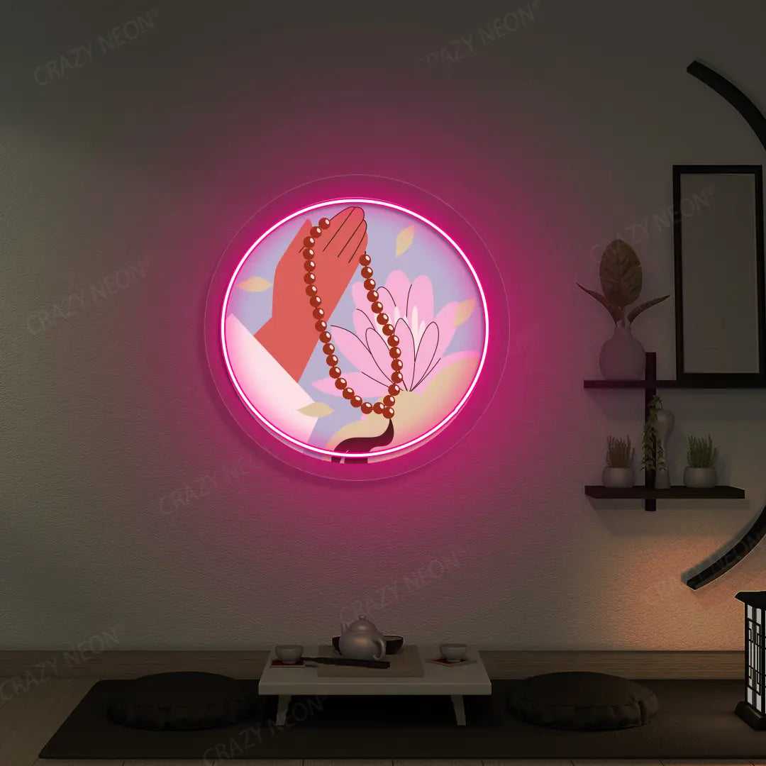 Lotus Japa Neon Artwork lighting up in pink color in a yoga room