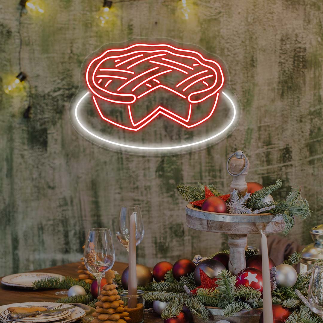 Thanksgiving pie neon sign in bright red above festive table with holiday ornaments and candles