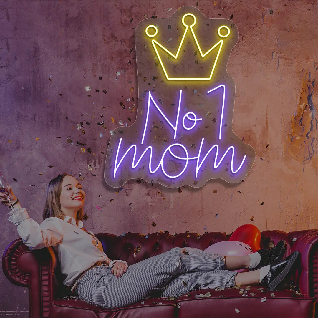 purple and yellow no 1 mom crown neon sign mounted on a wall