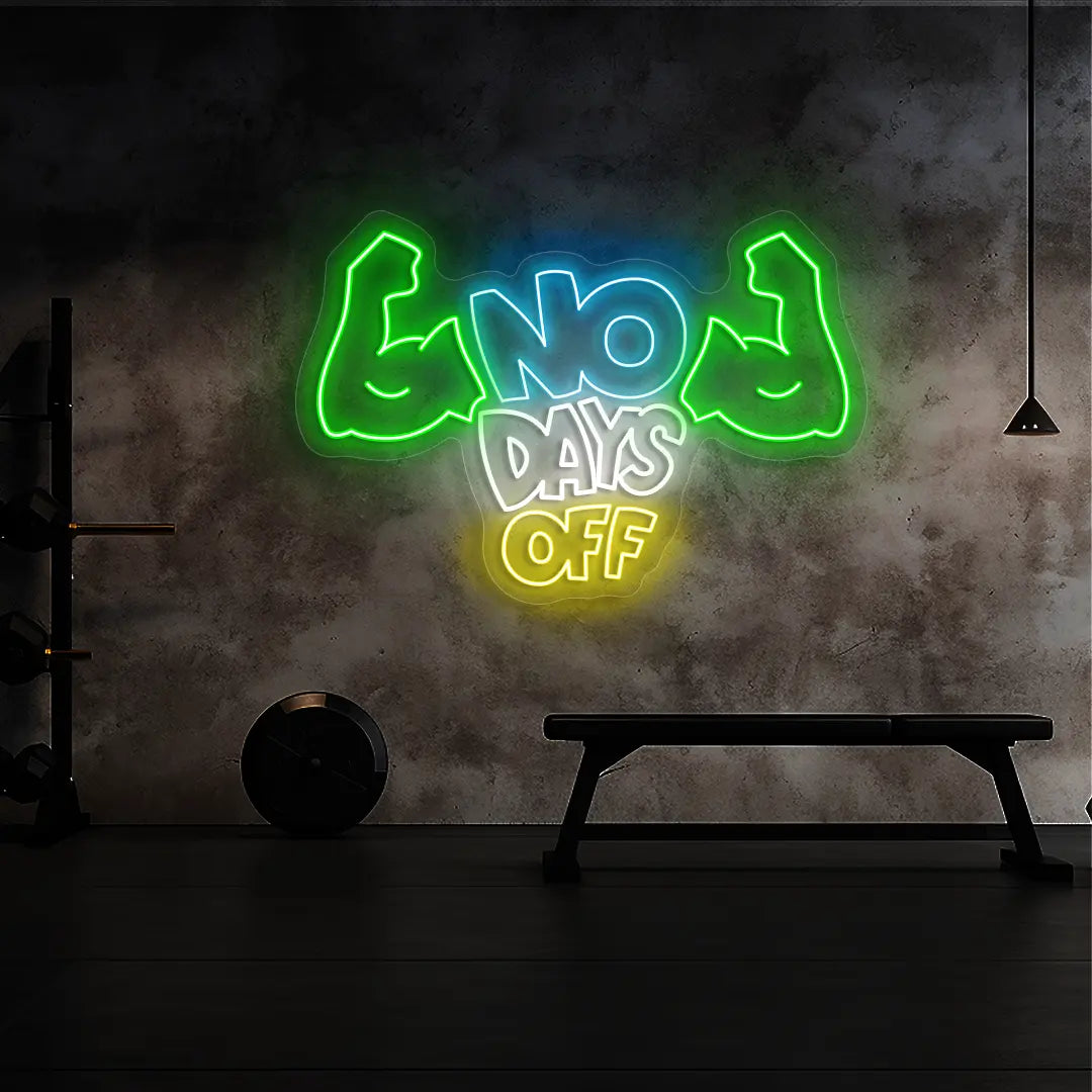 multi color no days off neon sign mounted on a wall