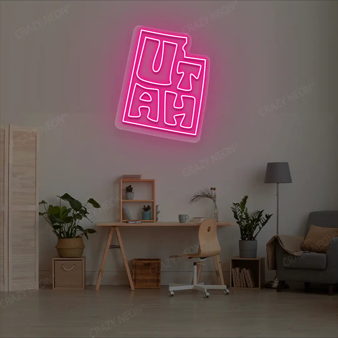 UTAH Map Neon Sign lighting up in pink color in a room