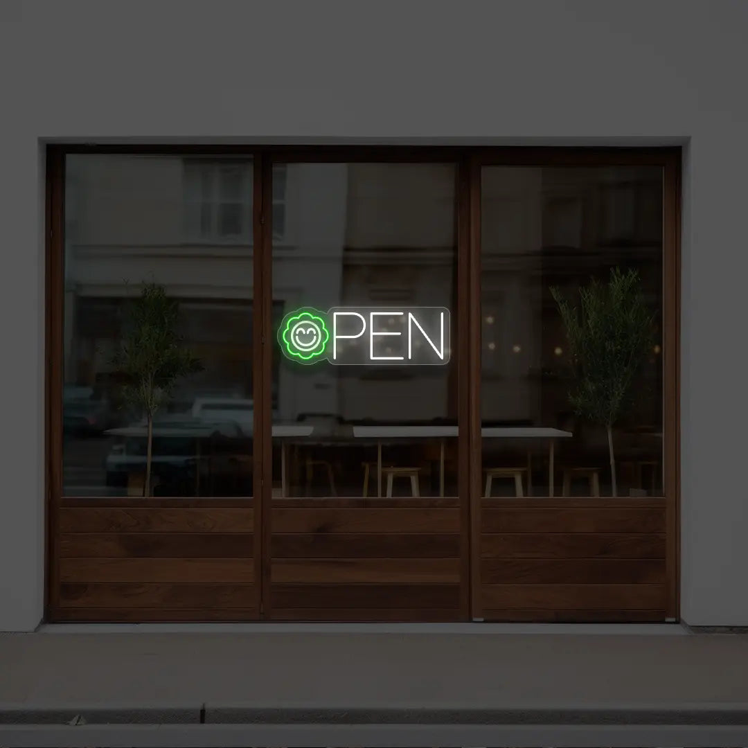 green flower open neon sign hanging on a window