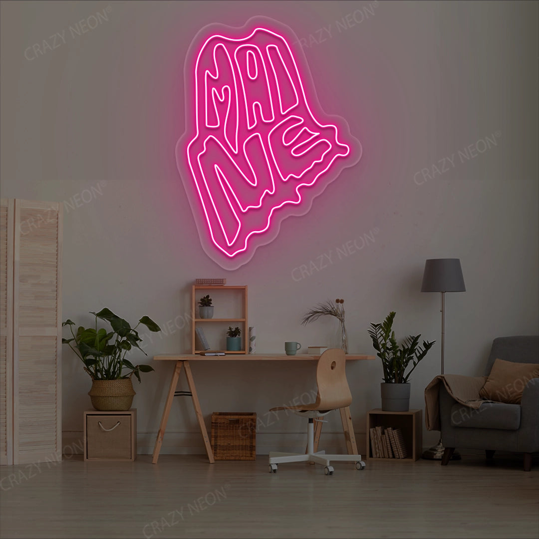 MAINE Map Neon Sign lighting up in pink color in a room
