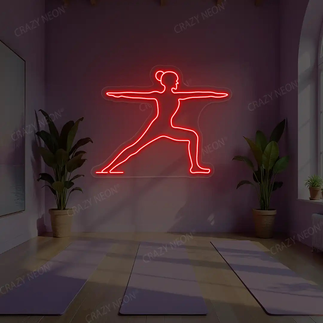 Virabhadrasana II Yoga Neon Sign lighting up in red color in a yoga room