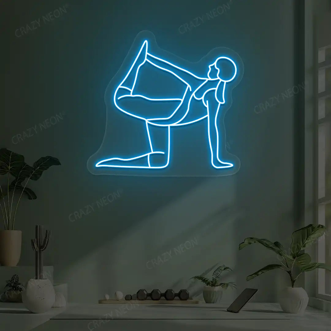 Ardha Dhanurasana Yoga Neon Sign glowing in ice blue color in a yoga room