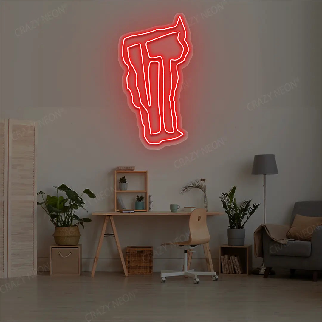 VERMONT Map Neon Sign lighting up in red color in a room