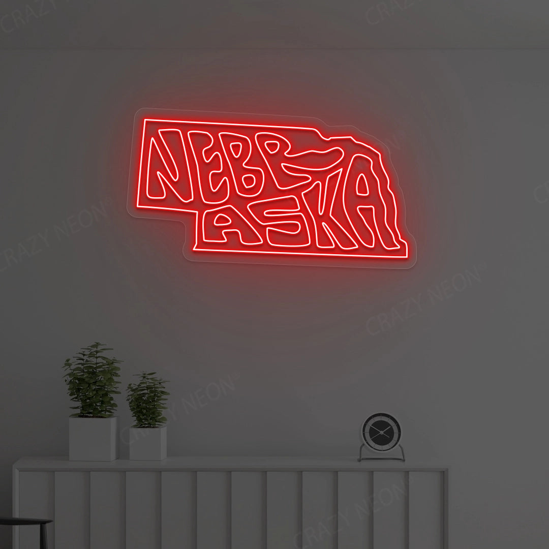 NEBRASKA Map Neon Sign lighting up in red color in a room