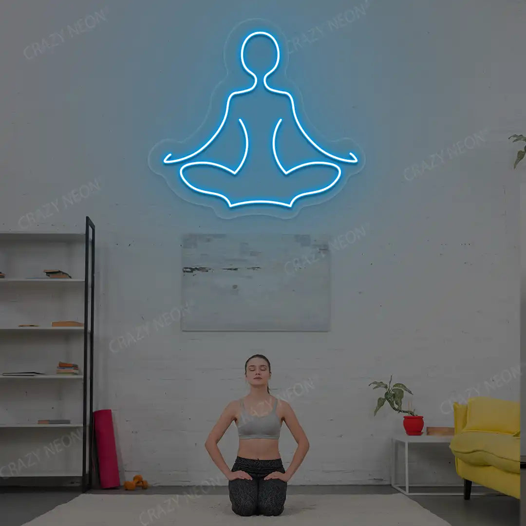 Sukhasana Yoga Neon Sign lighting up in iceblue color in a yoga room