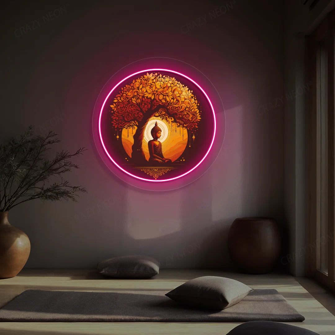 Golden Bodhi Buddha Neon Artwork lighting up in pink color in a yoga room