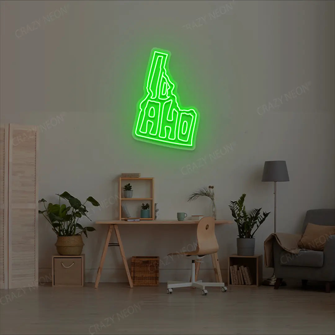 IDAHO Map Neon Sign lighting up in green color in a room
