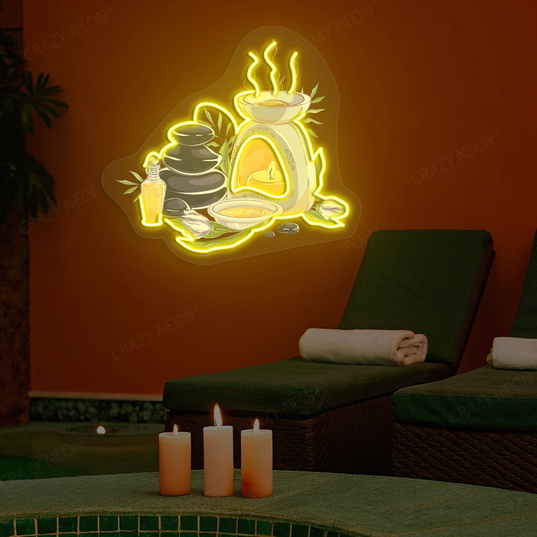 Spa Stones & Aromatherapy Neon Artwork lighting up in yellow color on a spa wall