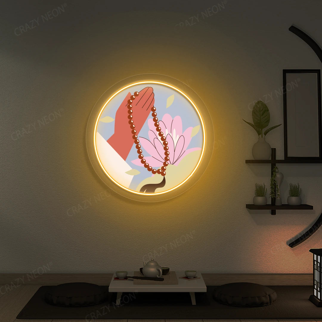 Lotus Japa Neon Artwork lighting up in orange color in a yoga room