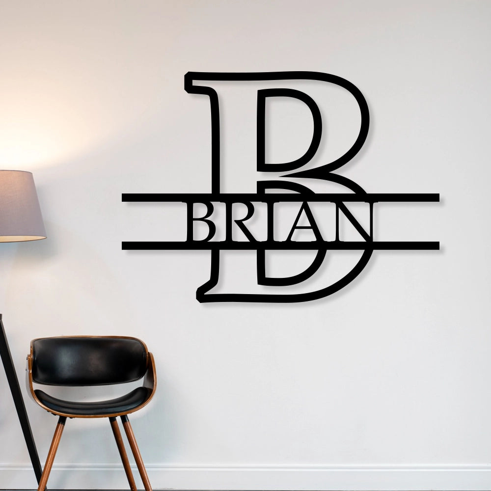 Split Letter Metal Monogram sign in black colour mounted on a wall