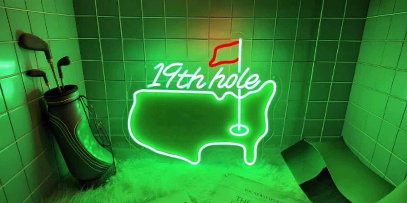 19th hole golf neon sign in green tiled room with golf bag and putting decor