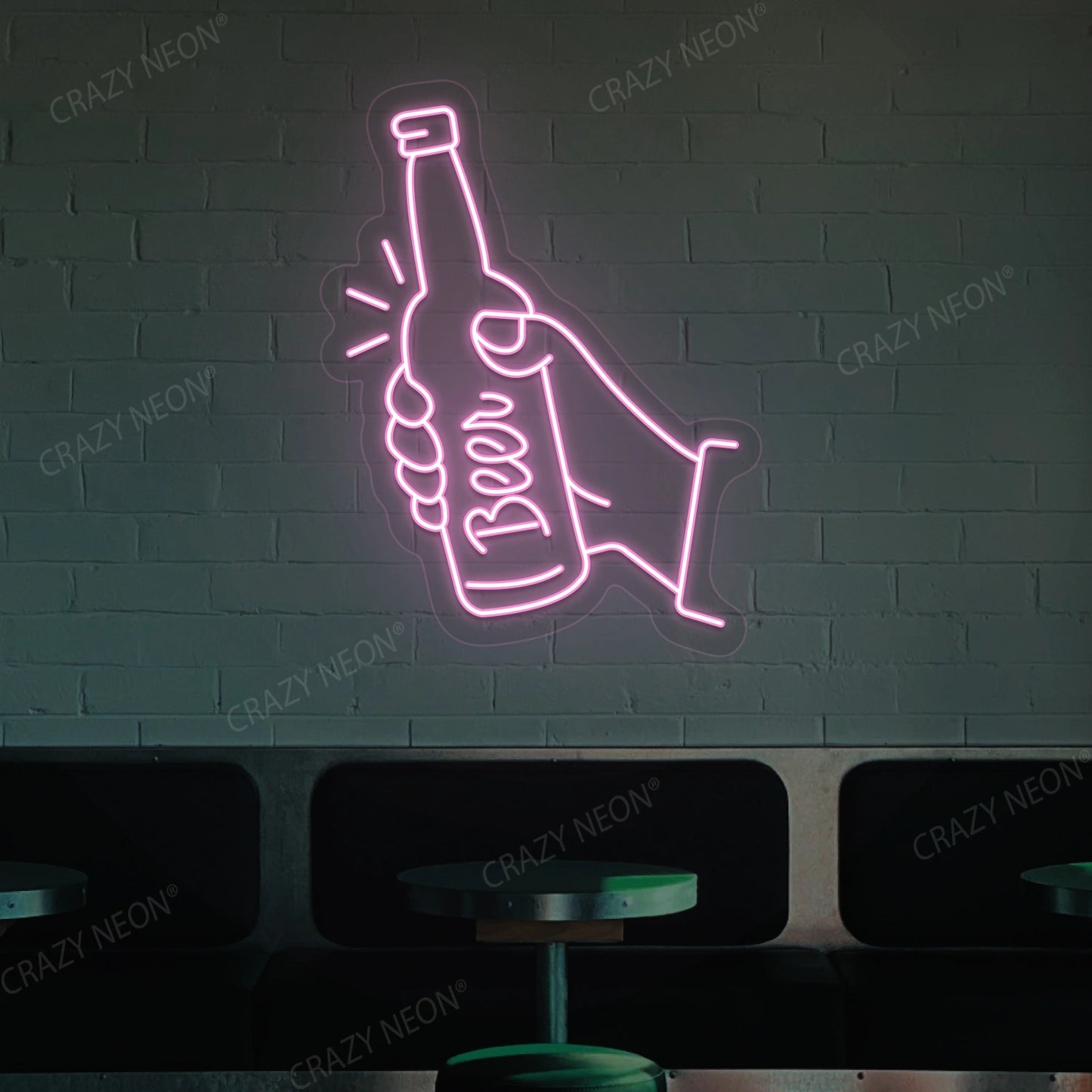 pink beer in hand neon sign mounted on a wall