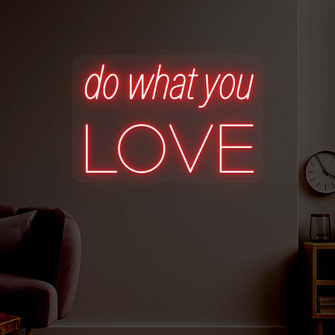 red do what you love neon sign mounted on a wall