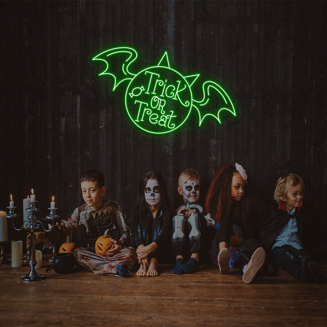 Trick Or Treat With Wings Neon Sign | green