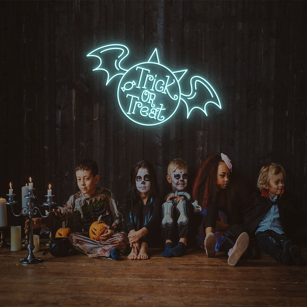 Trick Or Treat With Wings Neon Sign | Iceblue