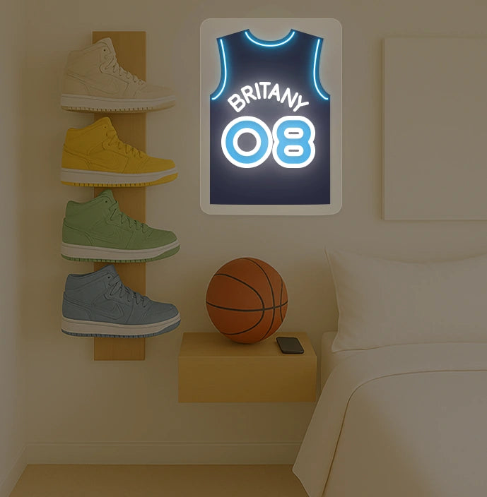 Memphis basketball jersey neon sign with BRITANY 08 in blue and white, modern bedroom with sneaker display and basketball