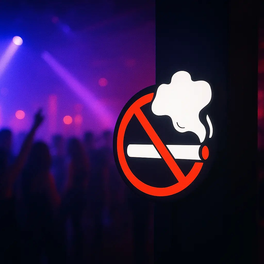 No smoking neon sign glowing in dark nightclub with colorful lights in background