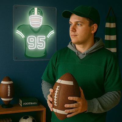 Man in green football jersey holding ball beside illuminated jersey neon sign with number 95