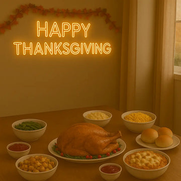 Thanksgiving dinner table with roasted turkey, side dishes, and Happy Thanksgiving neon sign on wall