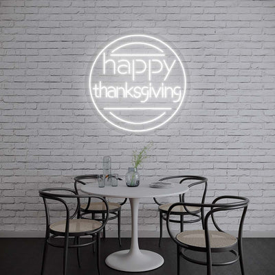 Happy Thanksgiving neon sign in modern round design, white lights on brick wall, minimalist dining room holiday decor