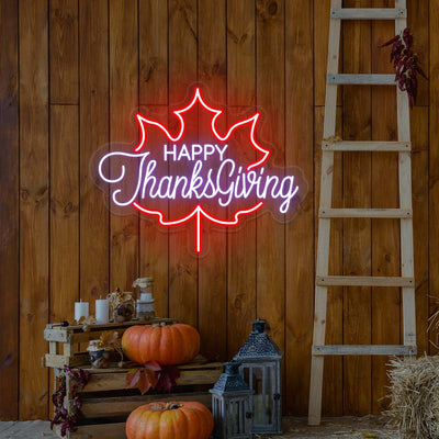 Happy Thanksgiving neon sign in red and white maple leaf shape, fall farmhouse wall decor with pumpkins and rustic ladder