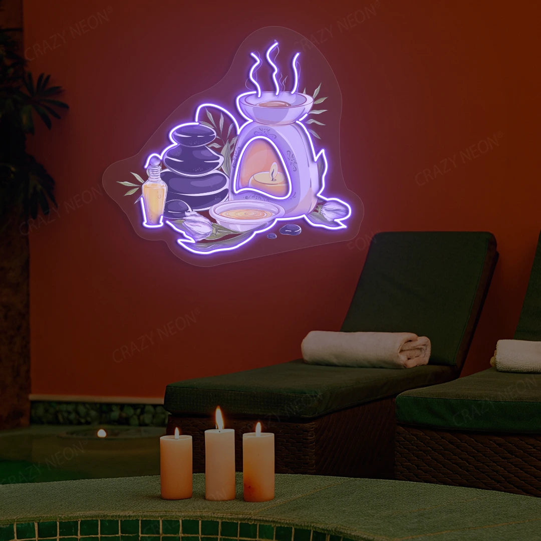 Spa Stones & Aromatherapy Neon Artwork lighting up in purple color on a spa wall
