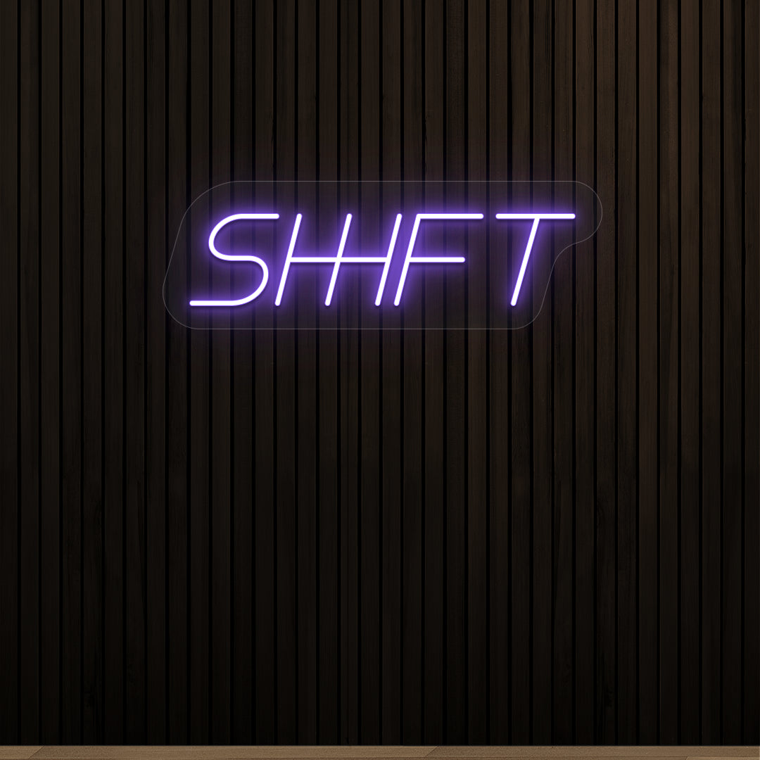 purple shift vintage neon sign mounted on a wall