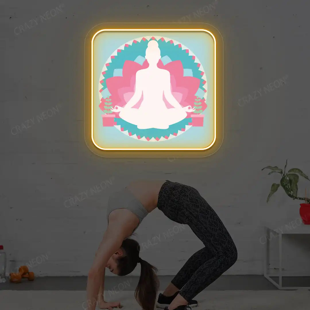 Padmasana Mandala Yoga Neon Artwork lighting up in orange color in a yoga room