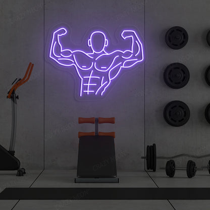 purple flexing bodybuilder gym neon sign mounted on a wall