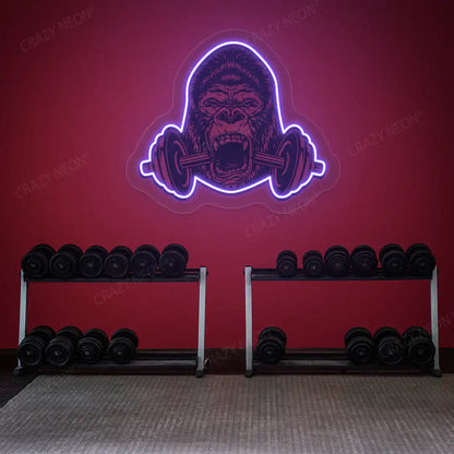 purple gorilla barbell gym neon artwork mounted on a wall