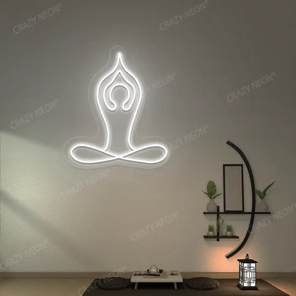 Padmasana With Raised Arms Yoga Neon Sign lighting up in white color in a yoga room