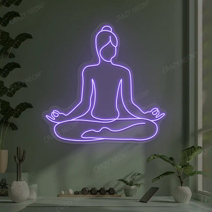 Swastikasana Contour Yoga Neon Sign lighting up in purple color in a yoga room