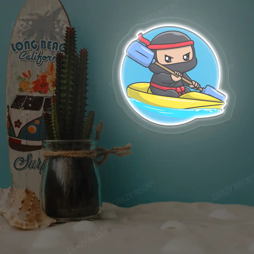white ninja kayaking neon artwork mounted on a wall