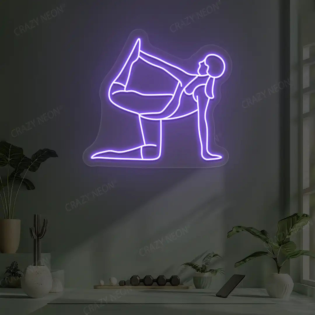 Ardha Dhanurasana Yoga Neon Sign glowing in purple color in a yoga room
