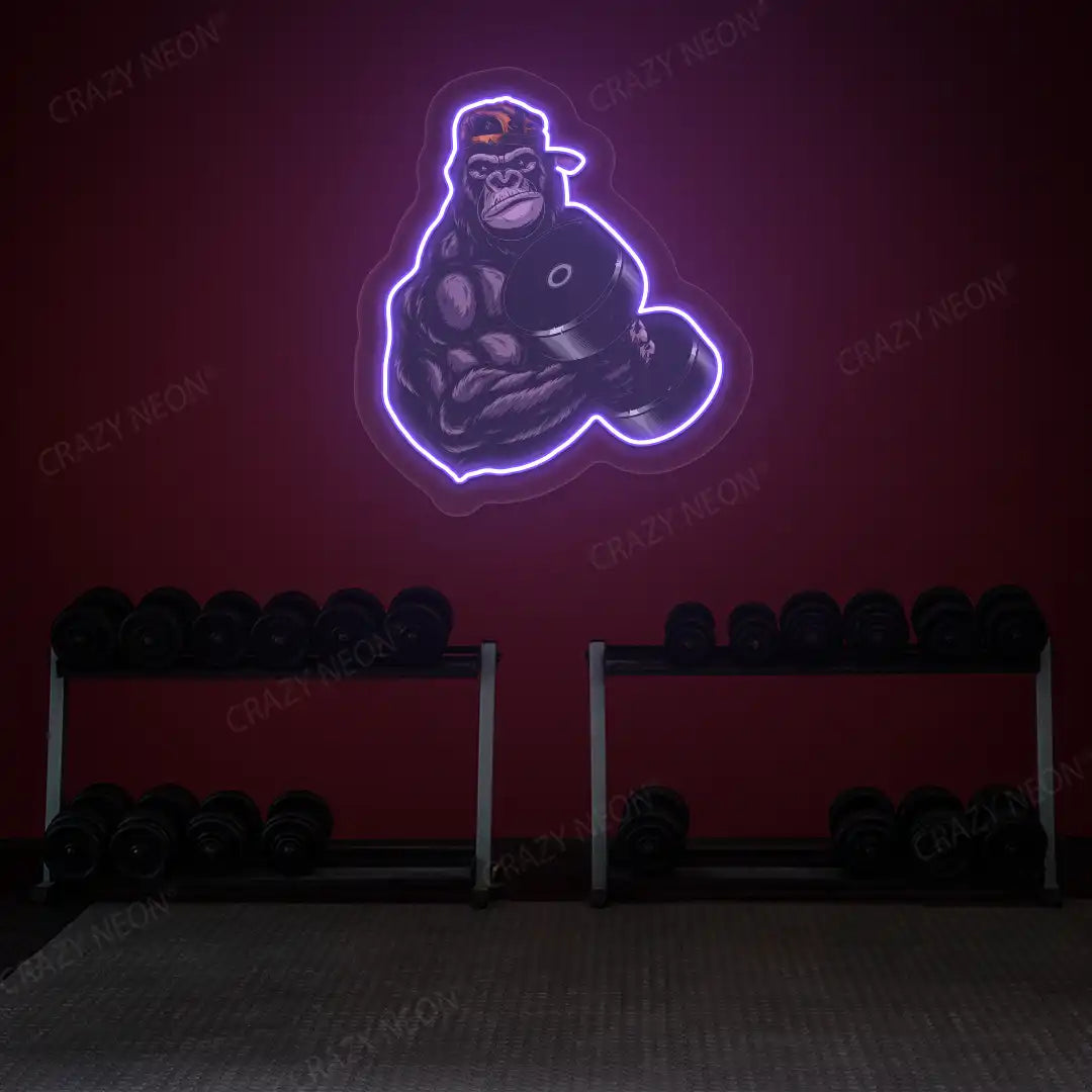 purple gorilla dumbbell lifting gym neon artwork mounted on a wall
