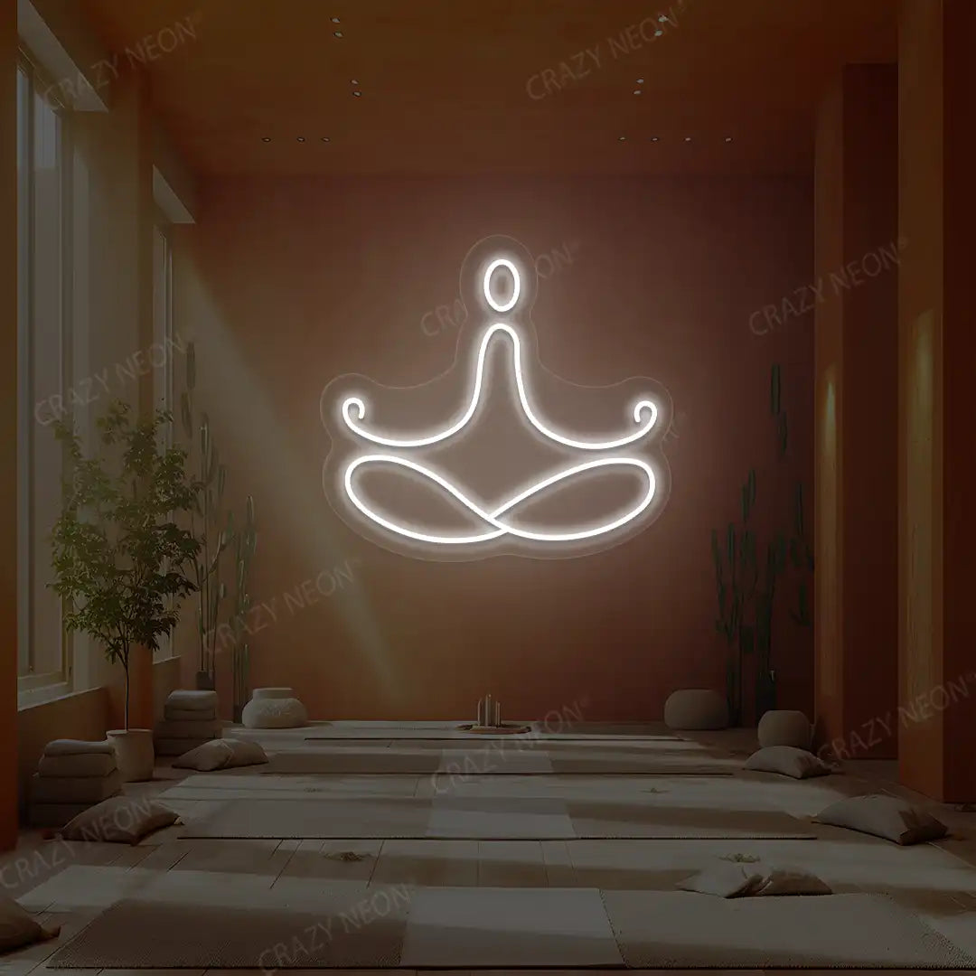 Padmasana Yoga Neon Sign lighting up in white color in a yoga room