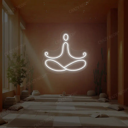 Padmasana Yoga Neon Sign lighting up in white color in a yoga room