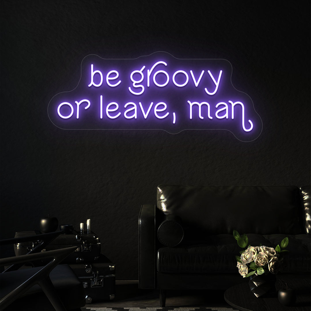 purple be groovy or leave, man vintage neon sign mounted on a wall