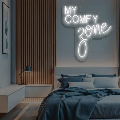 white my comfy zone neon sign mounted on a wall