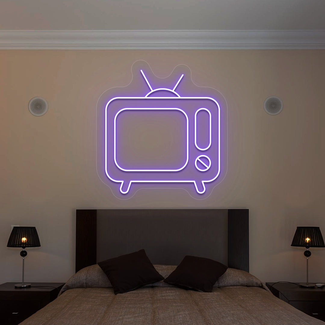 purple retro tv vintage neon sign mounted on a wall