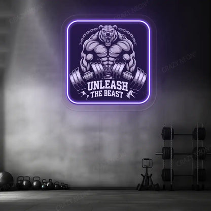 purple unleash the beast bear neon artwork mounted on a wall